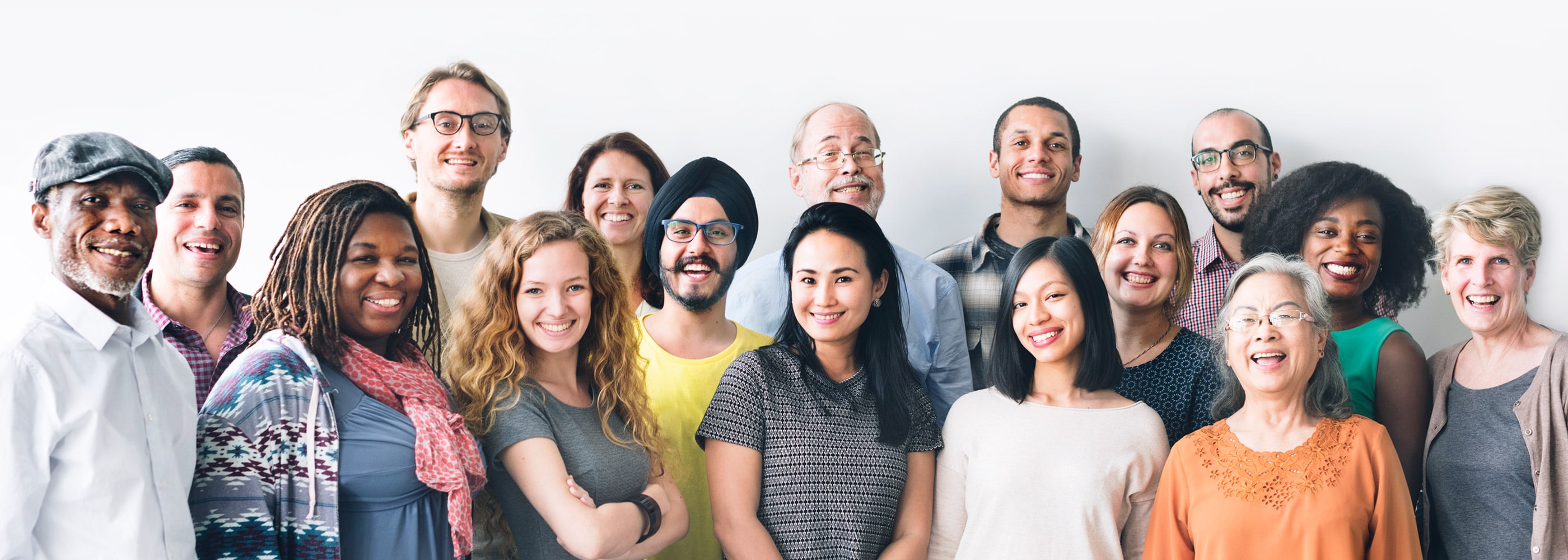 A group of adults of different ages standing together